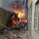 Illustration for article titled 159-Passenger Airliner Crashes Into Apartment Building (WARNING: Strong Images)